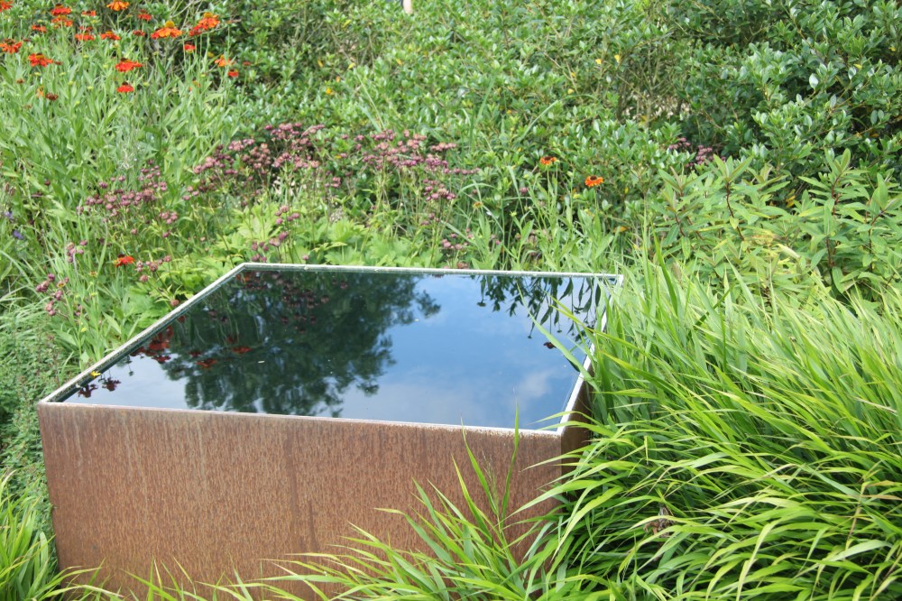 LUSH PLANTING AROUND TRADEMARK POOL